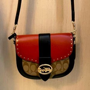 Coach Georgie Saddle Bag In Colorblock Signature Canvas With Rivets.